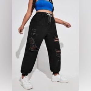 black ripped jogger jeans